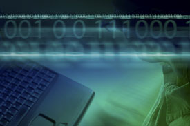 person with laptop, numeric data streams running across top of image